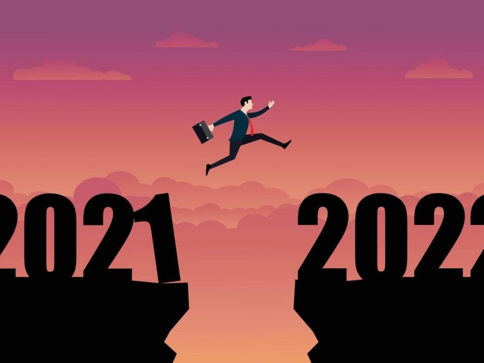 - a business person jumping to the new year 2022 vector1 960x720 - Will Offices Be Back in 2022?