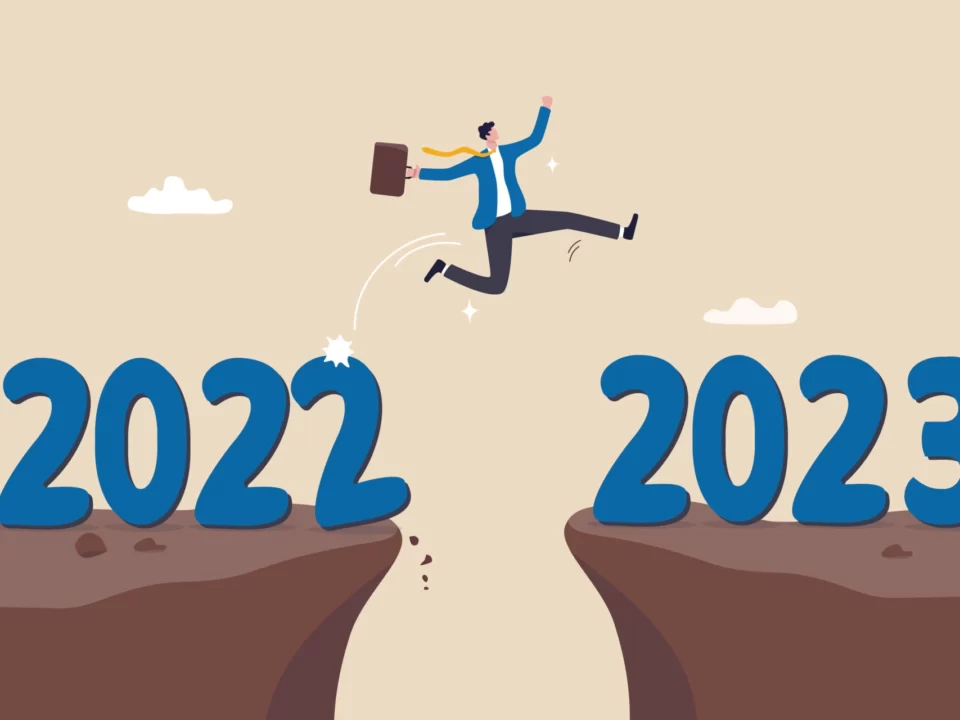workplace - happy new year 2023 hope for business success new year resolution or opportunity motivation and work enjoyment concept happy businessman jump cross the gap from year 2022 to 2023 vector 960x720 - 10 ways workplaces will change in 2023